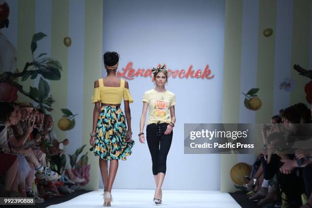 The photo shows models with the Lena Hoschek collection on the catwalk.