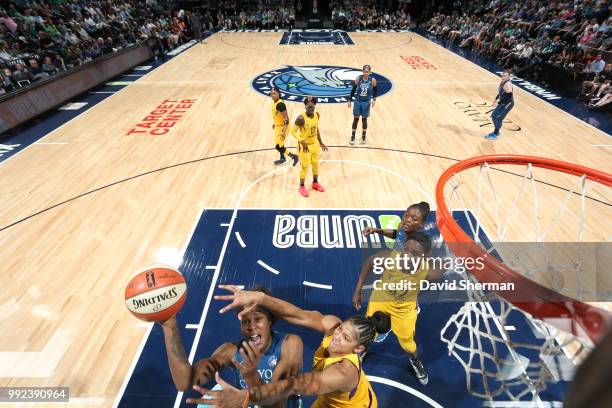 Rebekkah Brunson of the Minnesota Lynx handles the ball against Candace Parker of the Los Angeles Sparks on July 5, 2018 at Target Center in...