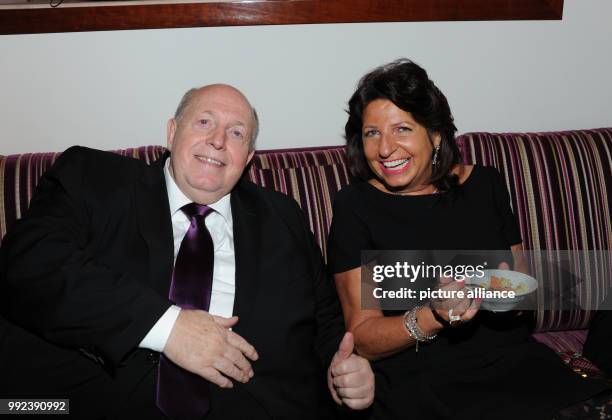 Babette Albrecht, ALDI widow, smiles with former soccer official Reiner Calmund during the 20th Busche Gala at the "Rocco Forte", the Charles Hotel...