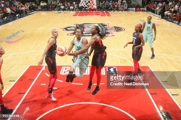Epiphanny Prince of the New York Liberty goes to the basket against the Washington Mystics on July 5, 2018 at the Verizon Center in Washington, DC....