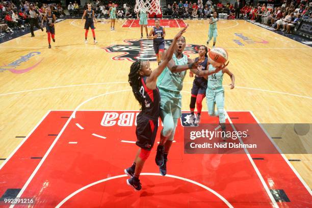 Tina Charles of the New York Liberty goes to the basket against the Washington Mystics on July 5, 2018 at the Verizon Center in Washington, DC. NOTE...