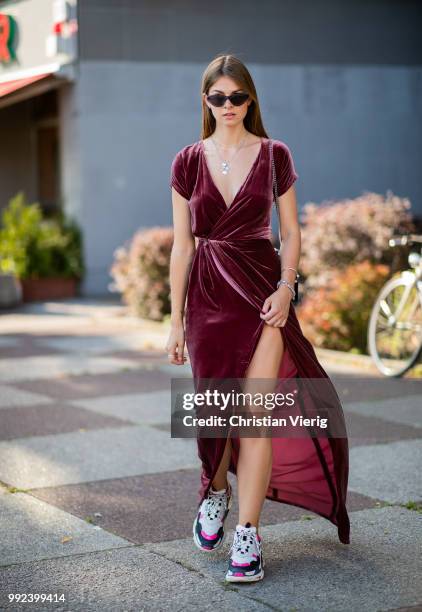 Jacqueline Zelwis wearing velvet dress, Balenciaga sneakers seen outside Dawid Tomaszewski during the Berlin Fashion Week July 2018 on July 5, 2018...