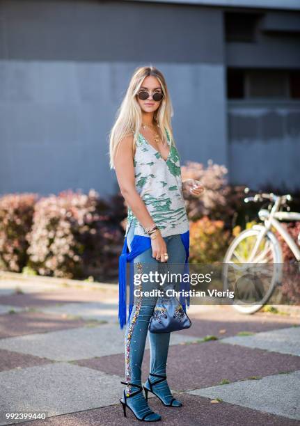 Nina Suess is seen outside Dawid Tomaszewski during the Berlin Fashion Week July 2018 on July 5, 2018 in Berlin, Germany.