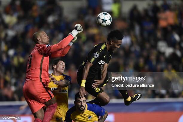 Nicosia's goalkeeper Boy Waterman punches the ball clear during the Champions League group stages qualification match between APOEL Nicosia and...