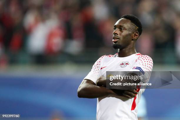 Leipzig's Jean-Kevin Augustin celebrates during the Champions League group stages qualification match between RB Leipzig and FC Porto in the Red Bull...