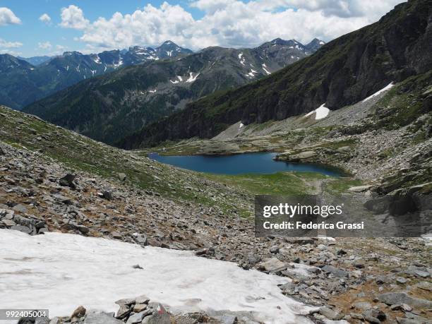 view of bognanco valley and middle paione lake (lago del paione di mezzo) - alpes lepontine - fotografias e filmes do acervo