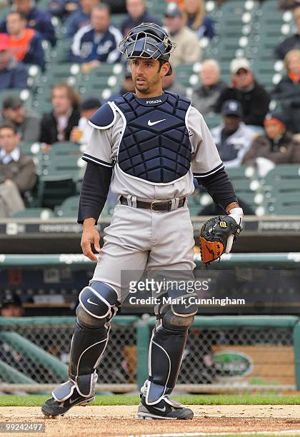 Jorge Posada of the New York Yankees looks on during the first game of a double header against the Detroit Tigers at Comerica Park on May 12, 2010 in...