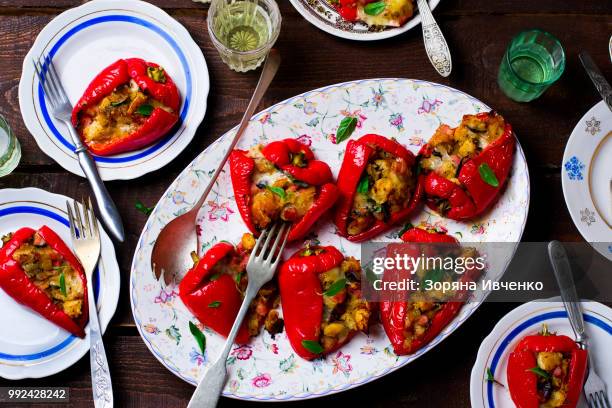 stuffed pepperoncini with a mozzarella, a pancetta and bread. italian appetizer. top view. selective - pancetta stock pictures, royalty-free photos & images