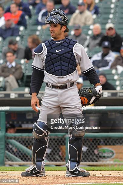 Jorge Posada of the New York Yankees looks on during the first game of a double header against the Detroit Tigers at Comerica Park on May 12, 2010 in...