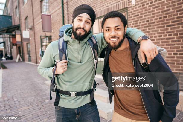 travel buddies - male 30 stock pictures, royalty-free photos & images