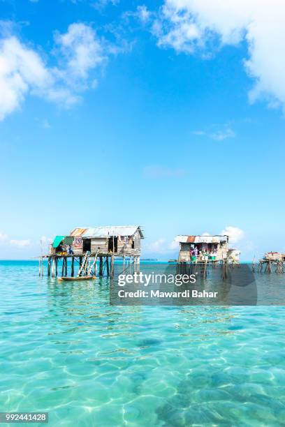 sabah, malaysia - august 17, 2015 : bajau laut house in bodgaya island, sabah, malaysia. they lived - laut stock pictures, royalty-free photos & images