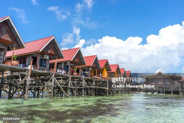 sabah, malaysia - august 15, 2015 : floating resort at mabul island, sabah, malaysia. - mabul island stock pictures, royalty-free photos & images