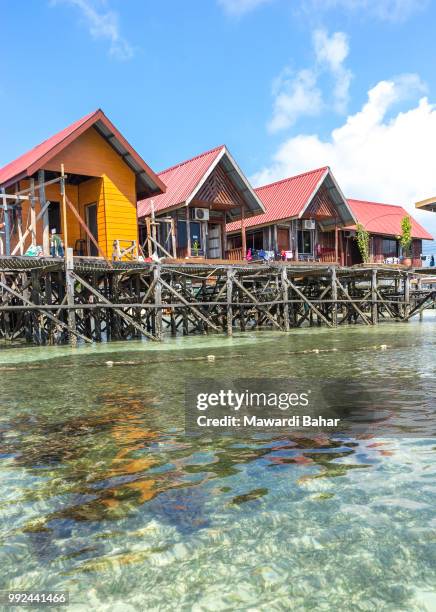 floating resort at mabul island, sabah, malaysia - mabul island stock pictures, royalty-free photos & images