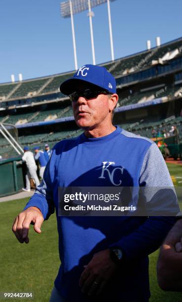Manager Ned Yost of the Kansas City Royals stands on the field prior to the game against the Oakland Athletics at the Oakland Alameda Coliseum on...