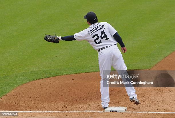 Miguel Cabrera of the Detroit Tigers fields during the first game of a double header against the New York Yankees at Comerica Park on May 12, 2010 in...