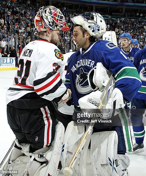 Antti Niemi of the Chicago Blackhawks and Roberto Luongo of the Vancouver Canucks shake hands after Game 6 of the Western Conference Semifinals...