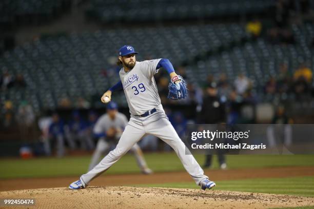 Jason Hammel of the Kansas City Royals pitches during the game against the Oakland Athletics at the Oakland Alameda Coliseum on June 7, 2018 in...