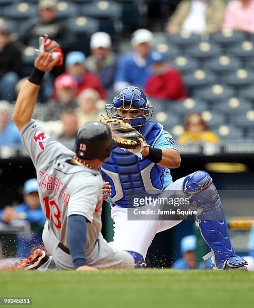 Catcher Brayan Pena of the Kansas City Royals tags out Asdrubal Cabrera of the Cleveland Indians in a play at the plate during the first inning of...