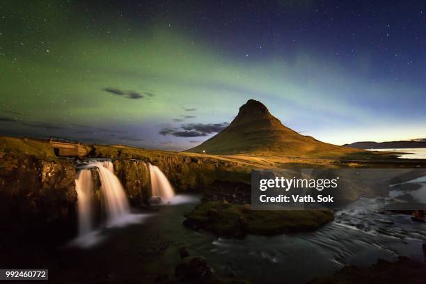 aurora over the kirkjufell, iceland - sok stock pictures, royalty-free photos & images