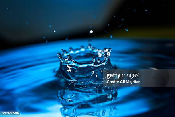 water drop - high speed photography stock pictures, royalty-free photos & images