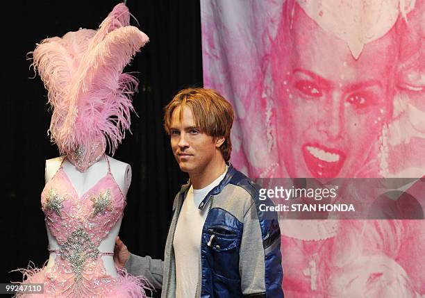 Larry Birkhead, partner of Anna Nicole Smith , poses with an item from the late model's estate May 13, 2010 in New York. Property from Smith's estate...