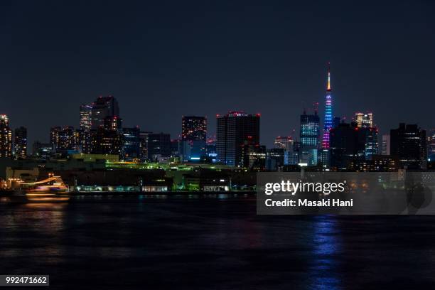 tokyo tower and rainbowbridge at night - masaki stock pictures, royalty-free photos & images