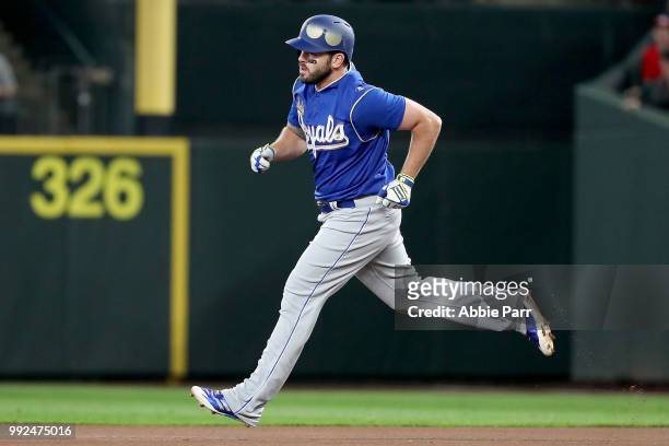 Mike Moustakas laps the bases after hitting a three run home run against the Seattle Mariners during their game at Safeco Field on June 30, 2018 in...