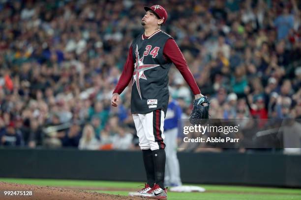 Felix Hernandez of the Seattle Mariners reacts in the fifth inning against the Kansas City Royals during their game at Safeco Field on June 30, 2018...