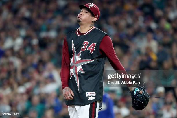 Felix Hernandez of the Seattle Mariners reacts in the fifth inning against the Kansas City Royals during their game at Safeco Field on June 30, 2018...