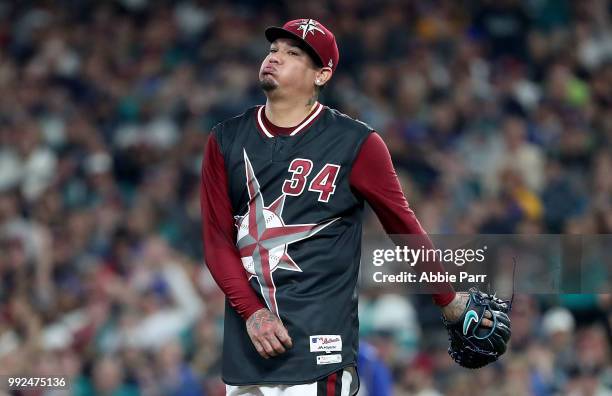 Felix Hernandez of the Seattle Mariners reacts in the fifth inning against the Kansas City Royals during their game at Safeco Field on June 30, 2018...