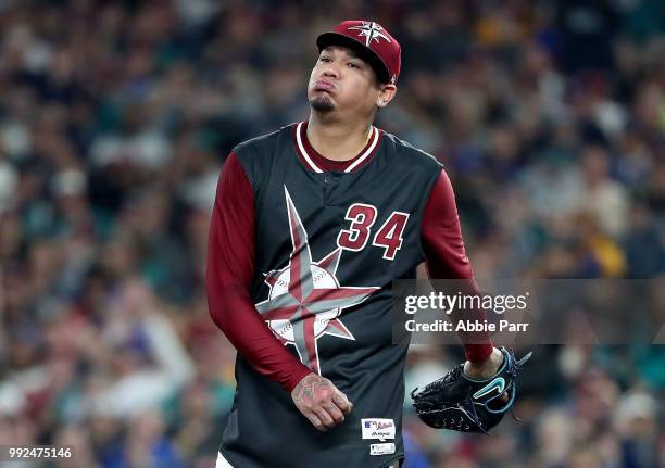 Felix Hernandez of the Seattle Mariners reacts in the fifth inning against the Kansas City Royals during their game at Safeco Field on June 30, 2018...