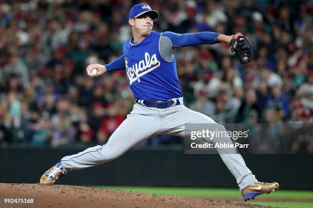 Heath Fillmyer of the Kansas City Royals pitches against the Seattle Mariners in the eighth inning during their game at Safeco Field on June 30, 2018...