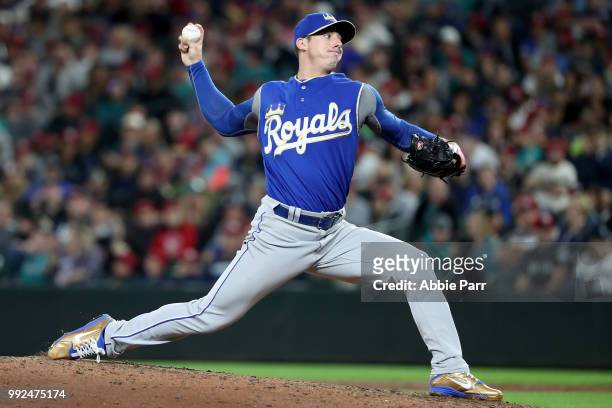 Heath Fillmyer of the Kansas City Royals pitches against the Seattle Mariners in the eighth inning during their game at Safeco Field on June 30, 2018...