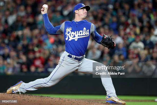 Heath Fillmyer of the Kansas City Royals pitches against the Seattle Mariners in the eighth inning during their game at Safeco Field on June 30, 2018...