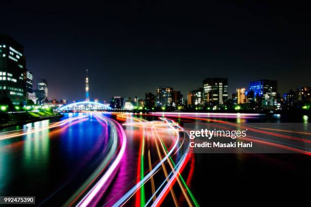 tokyo sky tree light up and ship lightwave - masaki stock pictures, royalty-free photos & images