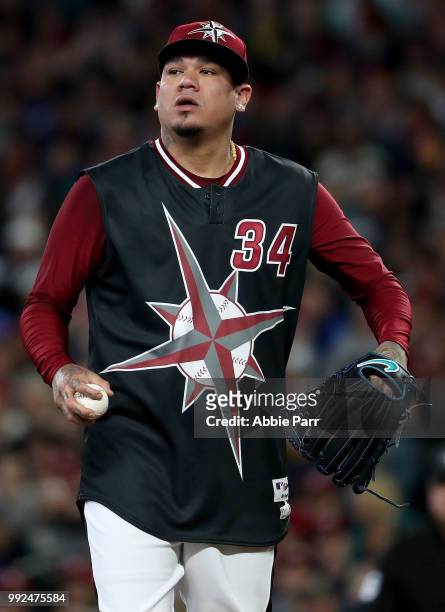 Felix Hernandez reacts after giving up a three run home run to Mike Moustakas in the first inning during their game at Safeco Field on June 30, 2018...
