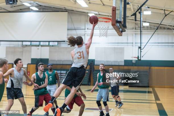 college basketball practice - high school basketball stock pictures, royalty-free photos & images