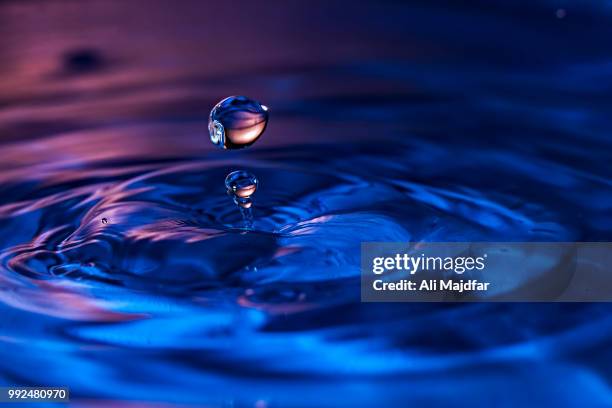 water drop - high speed photography stock pictures, royalty-free photos & images