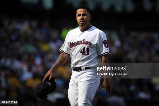 Junior Guerra of the Milwaukee Brewers walks off the field in the fifth inning against the Minnesota Twins at Miller Park on July 3, 2018 in...