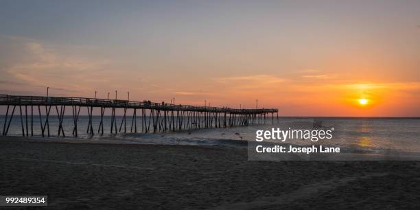 kitty hawk pier - kitty hawk beach stock pictures, royalty-free photos & images