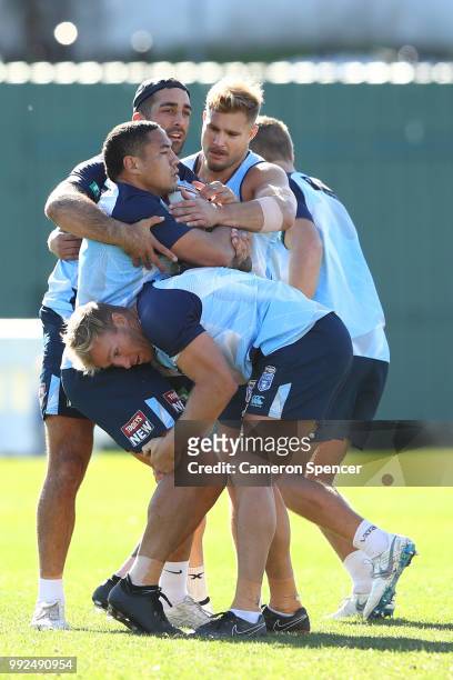 Tyson Frizell of the Blues is tackled during a New South Wales Blues State of Origin training session at Coogee Oval on July 6, 2018 in Sydney,...
