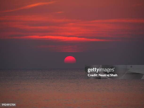 new years day sunset on surin beach - surin beach stock pictures, royalty-free photos & images