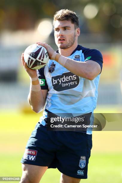 Angus Crichton of the Blues catches the ball during a New South Wales Blues State of Origin training session at Coogee Oval on July 6, 2018 in...