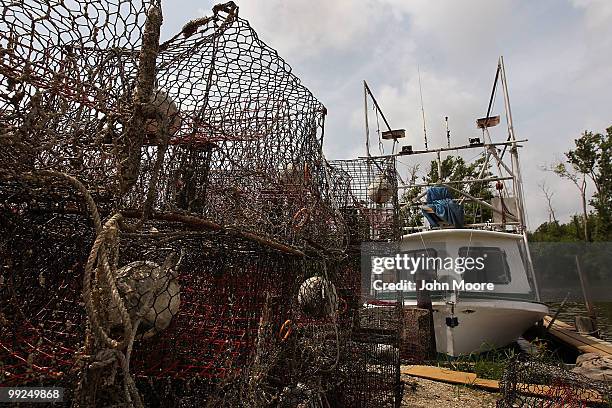 Crab traps sit idle on May 13, 2010 in Hopedale, Louisiana. The traps were all pulled from the Gulf waters last week after the federal government...