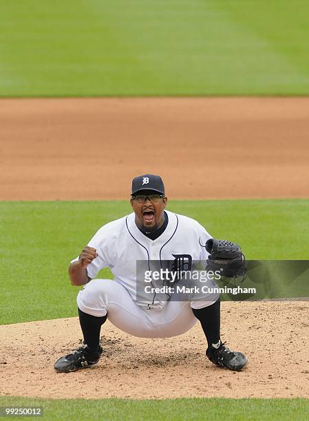 Jose Valverde of the Detroit Tigers yells in celebration of striking out Nick Swisher of the New York Yankees for the final out of the first game of...