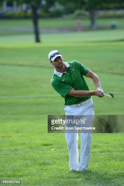 Logan Lagodich punches out from the tree's on the second hole during the Military Tribute at the Greenbrier Classic on July 05, 2018 in White Sulphur...