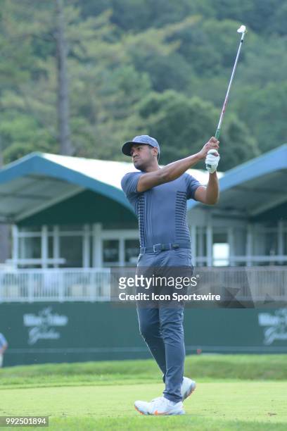 Tony Finau hits a tee shot on the 18th hole during the Military Tribute at the Greenbrier Classic on July 05, 2018 in White Sulphur Springs, WV.