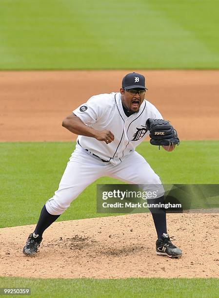 Jose Valverde of the Detroit Tigers yells in celebration of striking out Nick Swisher of the New York Yankees for the final out of the first game of...