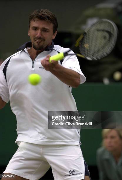 Goran Ivanisevic of Croatia on his way to victory over Tim Henman of Great Britain during the men's semi-final's of The All England Lawn Tennis...