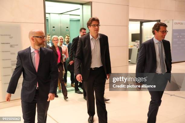 General secretary Peter Tauber , senior Green Party member Michael Kellner, and CDU general secretary Andreas Scheuer after taking part in the first...